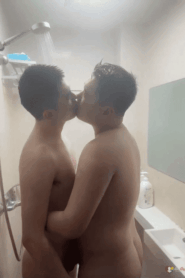 Two Young Chubby Men in an Intimate Bedroom Scene