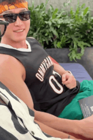 Two Young Athletic Men in a Private Bedroom Encounter