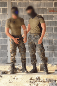 Two Young Muscular Men in an Intimate Outdoor Scene