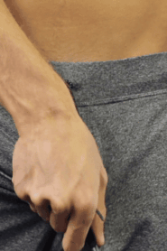 Two Young Muscular Men in an Intimate Indoor Scene