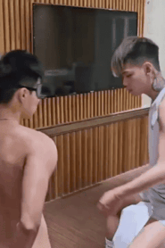 Two Young Muscular Men Share a Private Moment in the Hotel Room