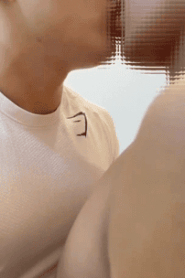 Two Young Muscular Men Share a Private Moment in the Bedroom