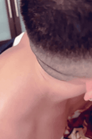 Two Prime-Age Muscular Men in an Intimate Bedroom Scene