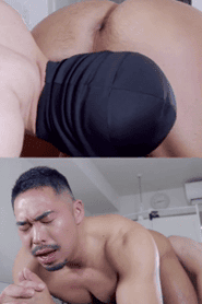Two Young Muscular Men in an Intimate Indoor Scene