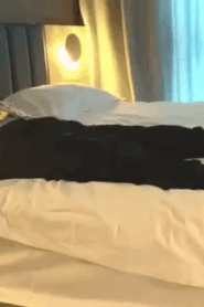 A Young Bulky Man in a Private Bedroom Moment