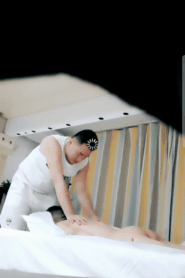 Two Young Muscular Men in an Intimate Massage Room Scene