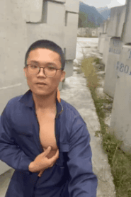 A Young Muscular Man in an Intimate Outdoor Scene