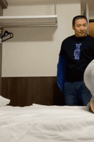 Two Young Muscular Men Share a Private Moment in the Bedroom