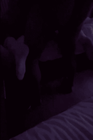 Two Young Muscular Men Share a Private Moment in the Bedroom