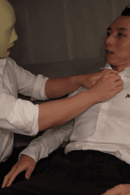 Two Young Muscular Men Share a Private Moment in the Sofa Setting